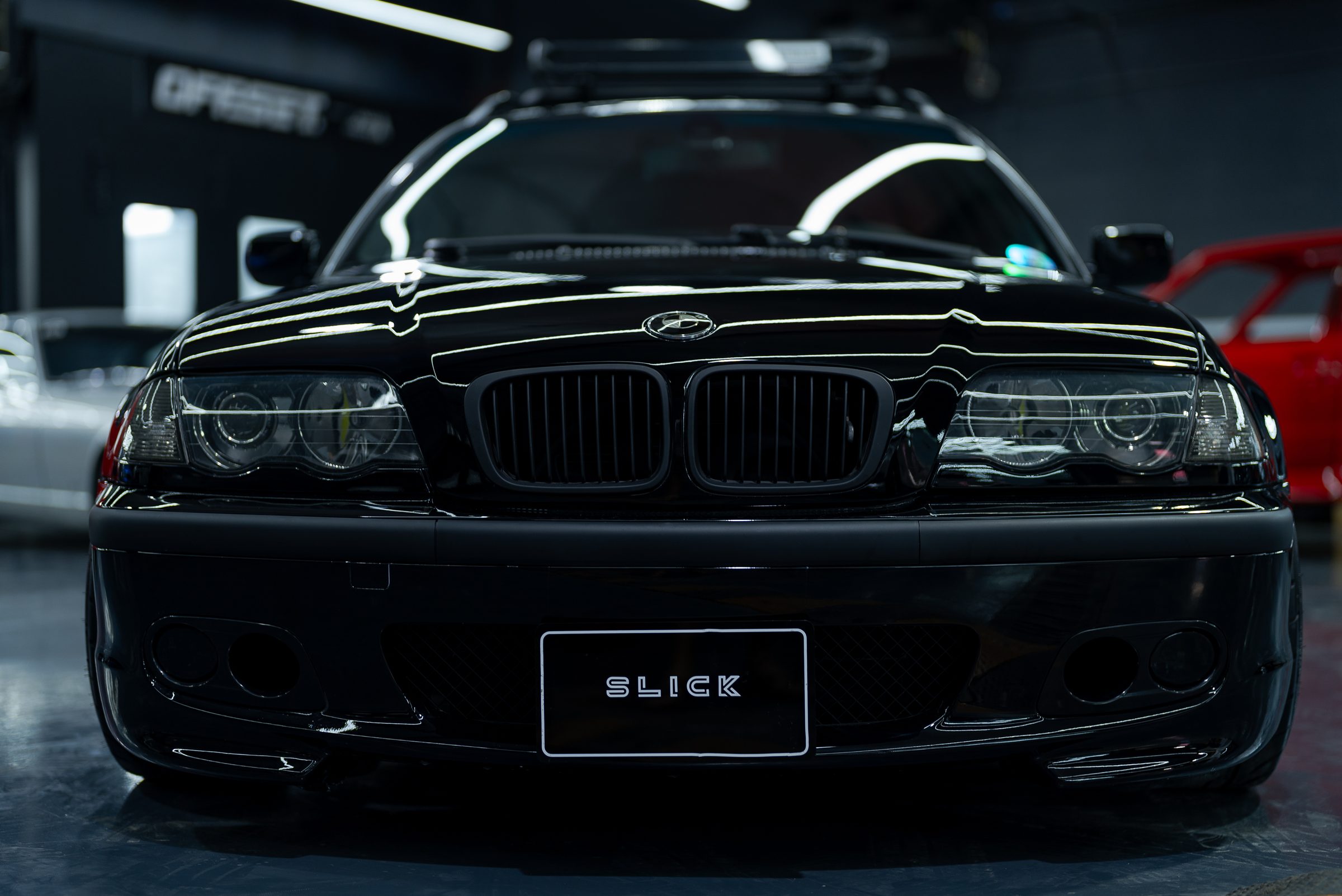 A black BMW M3 E46 photographed head-on